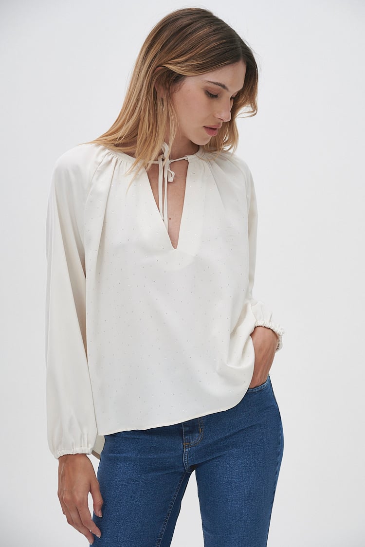 blusa amplia con brillos
