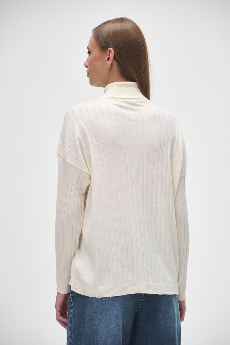 Polera larga estilo trenzado